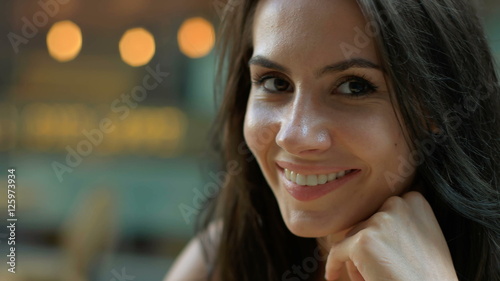 Beautiful lady finishing her tasty coffee.