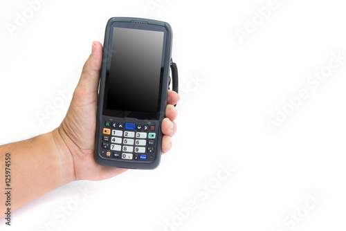 Male hands using a hand held barcode scanner Enterprise Digital Assistant computer.