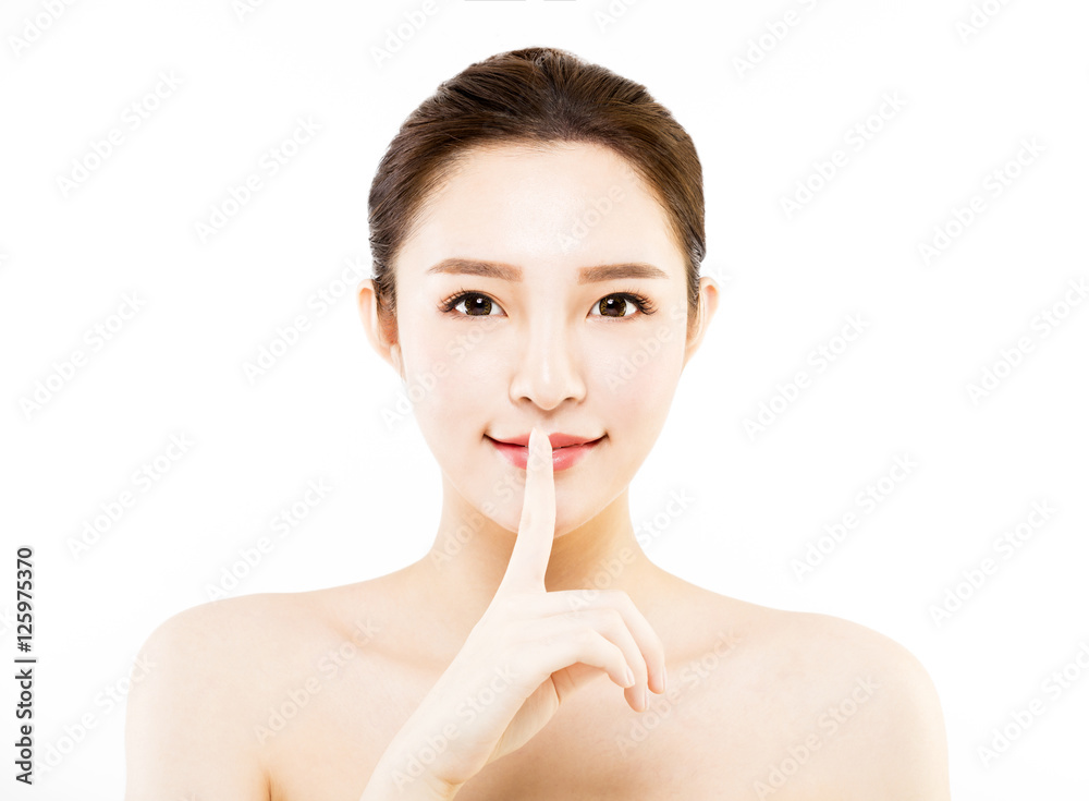  closeup  young   woman  face with quiet gesture