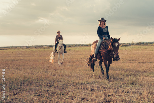 Girls Riding Horses in the Plains Mallorca