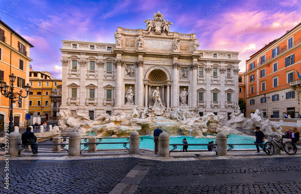 Sunrise view of Rome Trevi Fountain (Fontana di Trevi) in Rome, Italy. Trevi is most famous fountain of Rome. Architecture and landmark of Rome