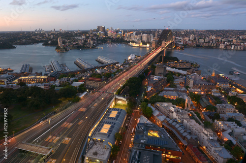 Aerial view at dusk of Sydney Harbour Bridge