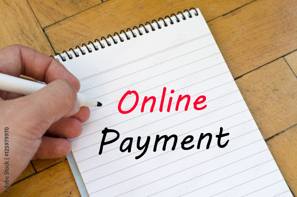 Online payment text concept on notebook Online payment text concept on notebook