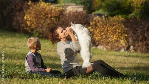 Wallpaper Mural young lady and boy with Maine Coon cat Torontodigital.ca