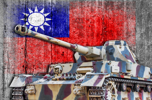 Military tank with concrete Taiwan flag photo