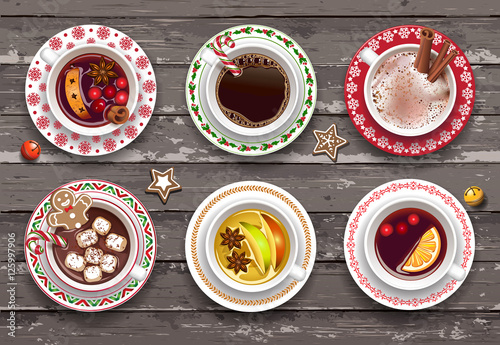 Set of different cups of warming autumn and Christmas drinks. Sketch on the chalkboard