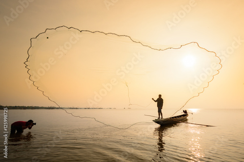 Photographer is shooting the fishermen at Pakpra village, Phatthalung, Thailand