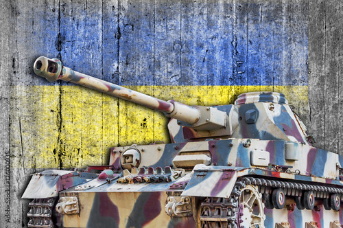 Military tank with concrete Ukraine flag