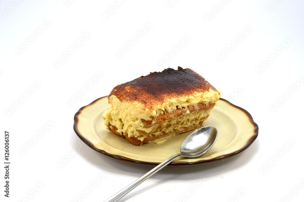 tiramisu share on a brown plate