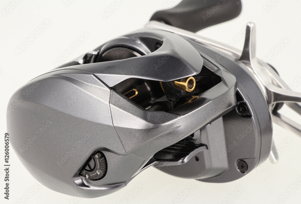 Fototapeta premium Multiplier fishing reel on white background.