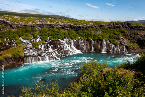 Hraunfossar series of waterfalls formed by rivulets streaming ov