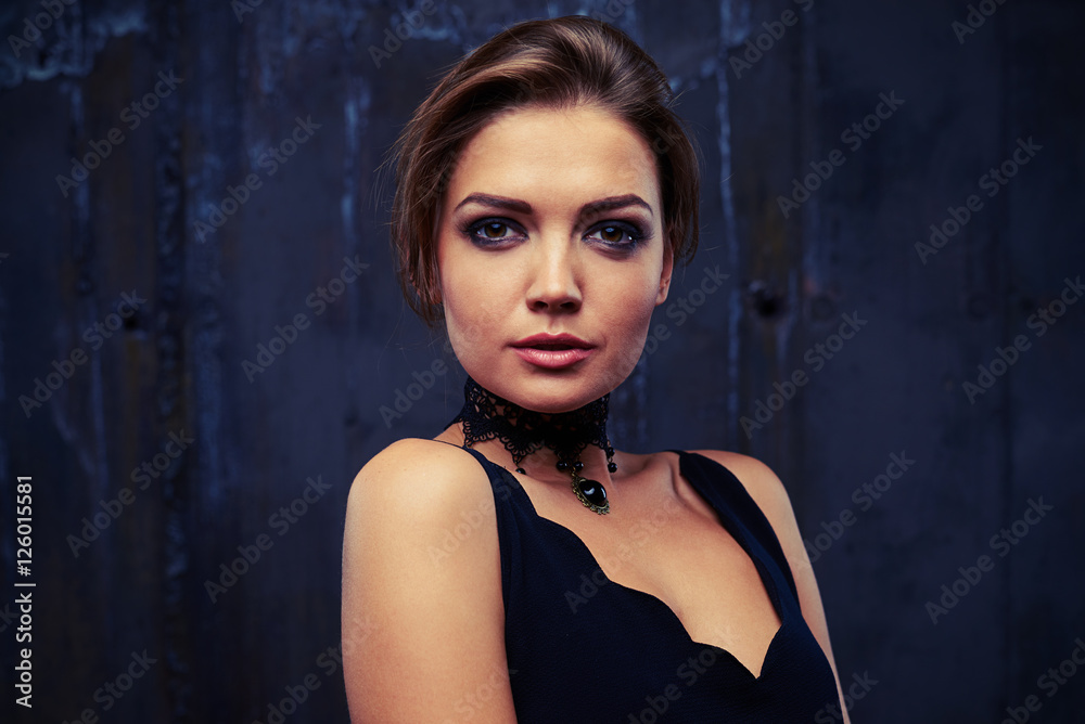 Relaxed girl with her mouth slightly open is posing at the camer Relaxed girl with her mouth slightly open is posing at the camer