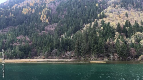 Beautiful landscape at Jiuzhaigou National Park  lake,pond and valley where is the UNESCO World Heritage in Sichuan , China in  Autumn  in November  located in  in  Tibetan-Qiang of Sichuan ,China photo