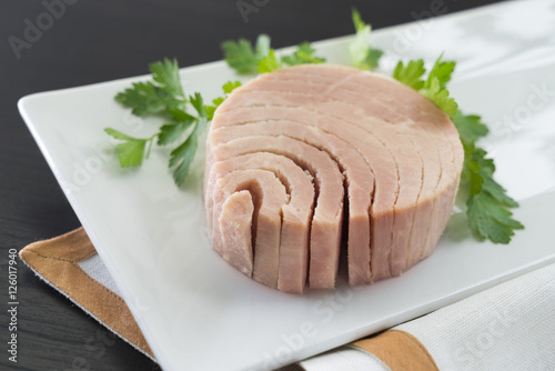 close-up canned tuna on plate photo