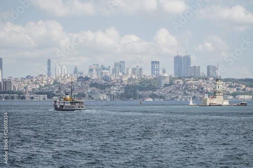 Ferry passes The Maiden's Tower on sea in Istanbul, Turkey © berna_namoglu