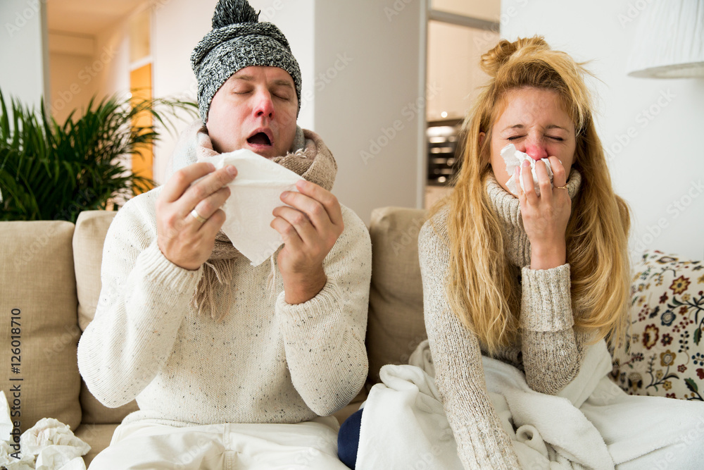 Sick couple catch cold. Man and woman sneezing, coughing, got flu, having runny nose. - obrazy, fototapety, plakaty 