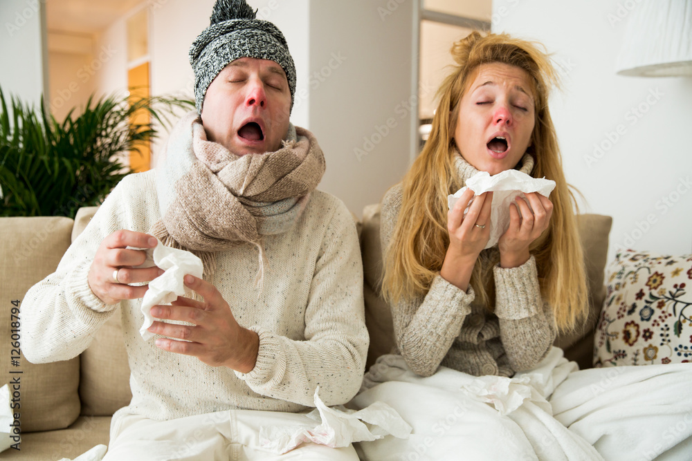 Sick couple catch cold. Man and woman sneezing, coughing, got flu, having runny nose. - obrazy, fototapety, plakaty 