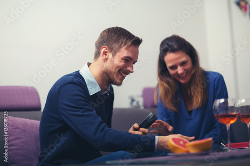 Young couple spending a relaxing day together at home