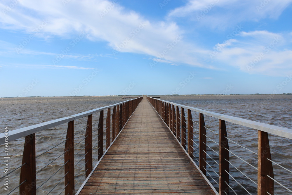 Lesina Lake and walkway leading to the island of San Clemente 