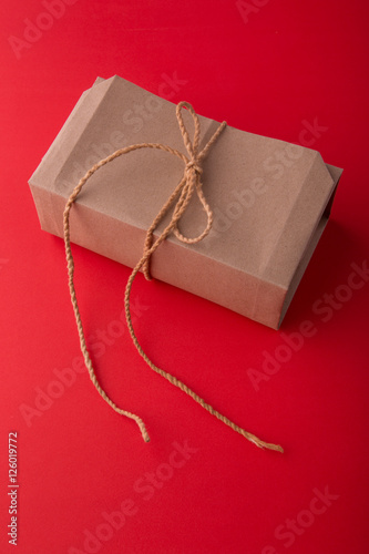 Gift box on red background