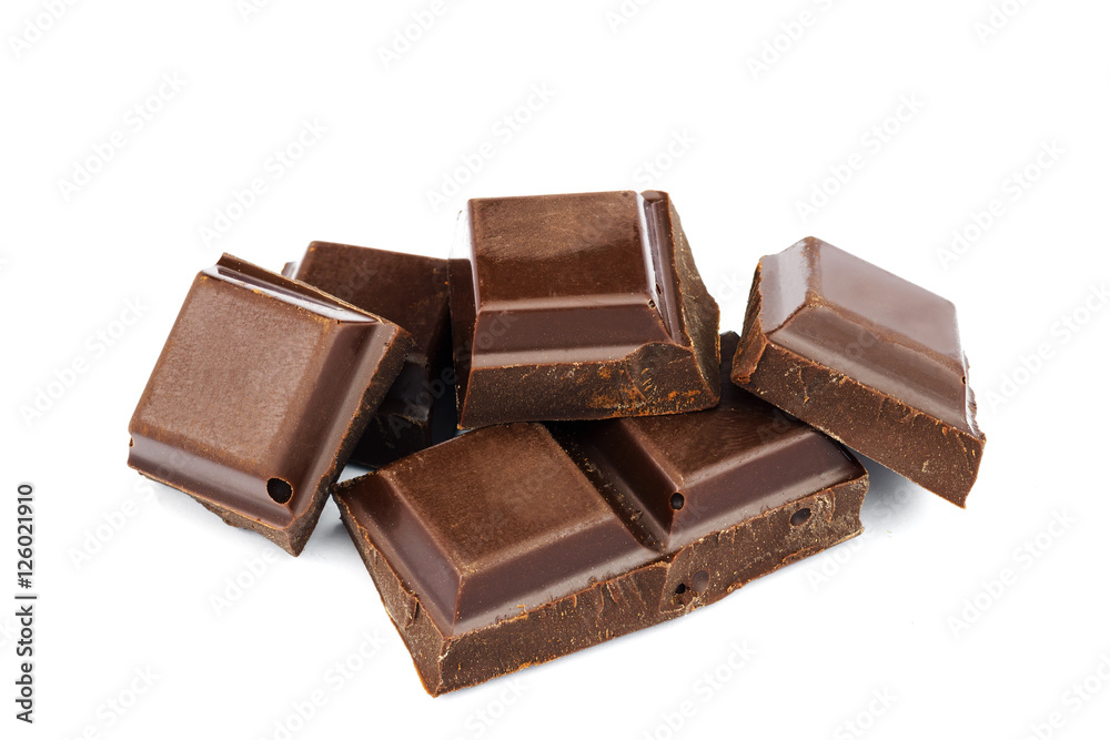 Dark chocolate cubes isolated on white background. Dark chocolate cubes isolated on white background.