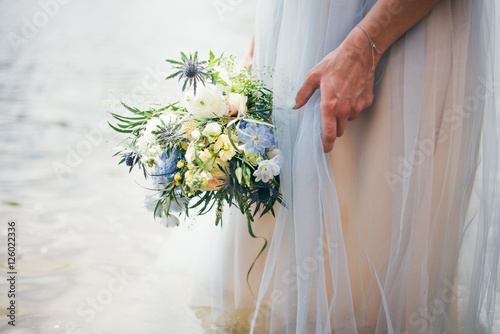 wedding bouquet in blue and white color