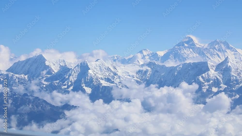 Mount Everst panorama aerial view from a plane with himalaya mountains Mount Everst panorama aerial view from a plane with himalaya mountains