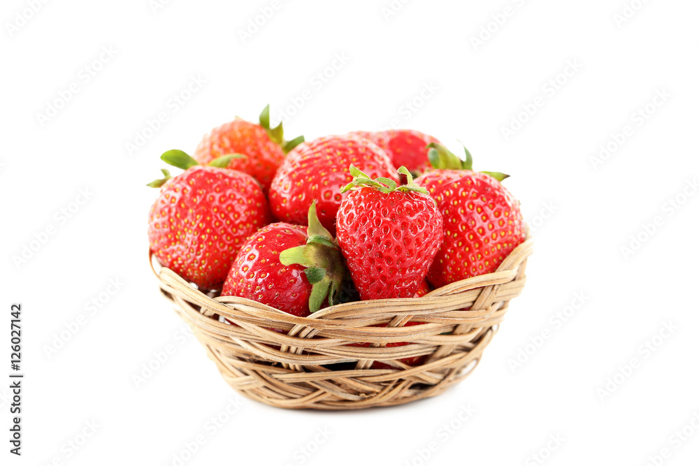 Strawberries in basket isolated on a white background Strawberries in basket isolated on a white background