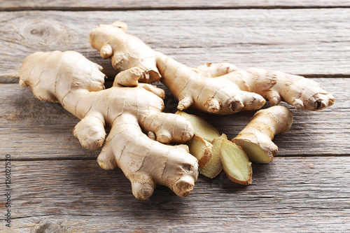 Ginger root on grey wooden table
