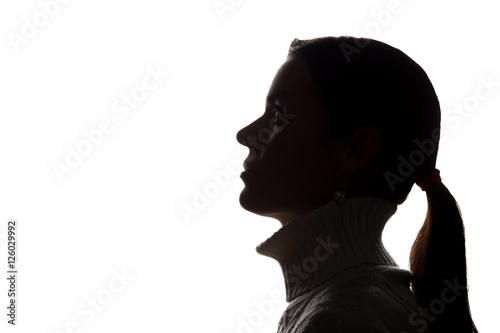 Young woman looking up - horizontal silhouette