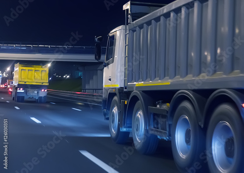 dump trucks transport freight on the night