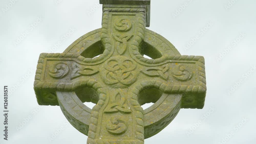 A high cross outside the Rock of Cashel in Ireland this spot is one of the tourist destinations in Ireland A high cross outside the Rock of Cashel in Ireland this spot is one of the tourist destinations in Ireland