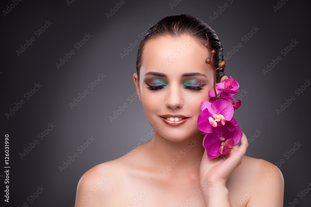 Beautiful woman with orchid flower Beautiful woman with orchid flower