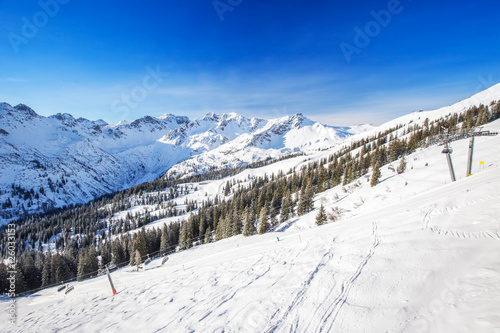 Ski slopes and chairlifts on the top of Fellhorn Ski resort, Bavarian Alps, Oberstdorf, Germany