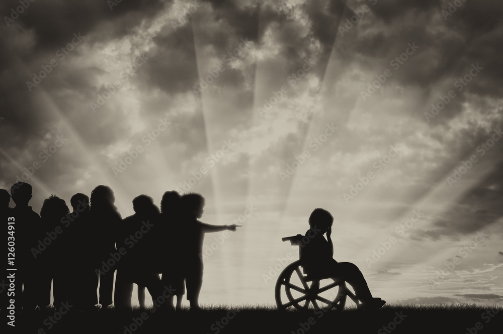 Obraz premium Disabled child in a wheelchair crying and children chased him