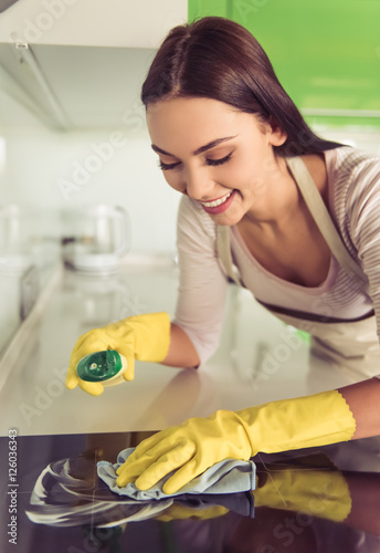 Woman cleaning her kitchen