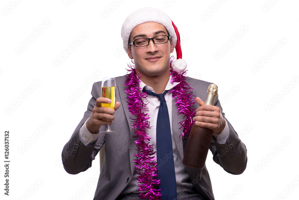 Young businessman celebrating christmas in office Young businessman celebrating christmas in office