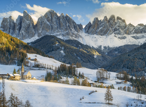 winter day with sun shining in Dolomites