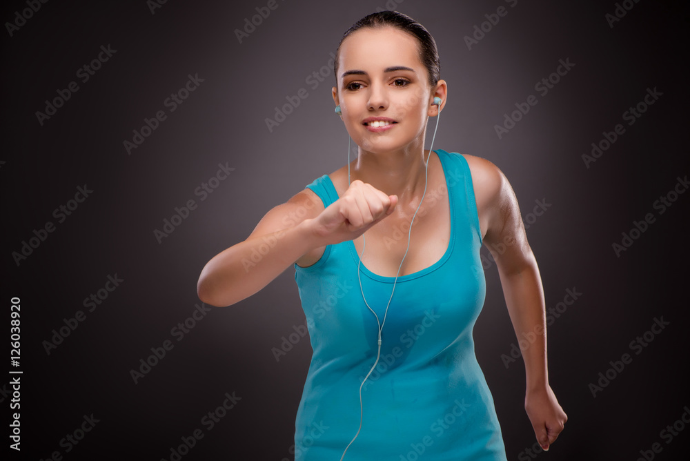 Young woman doing sports in sport concept Young woman doing sports in sport concept