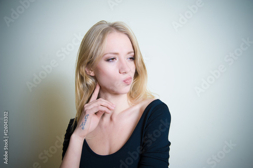 Thoughtful young blonde woman portrait © fabioderby