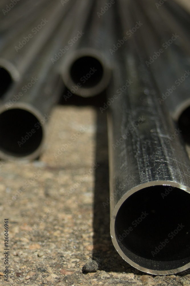 Stack of Many Pipes at the Construction Site Stack of Many Pipes at the Construction Site
