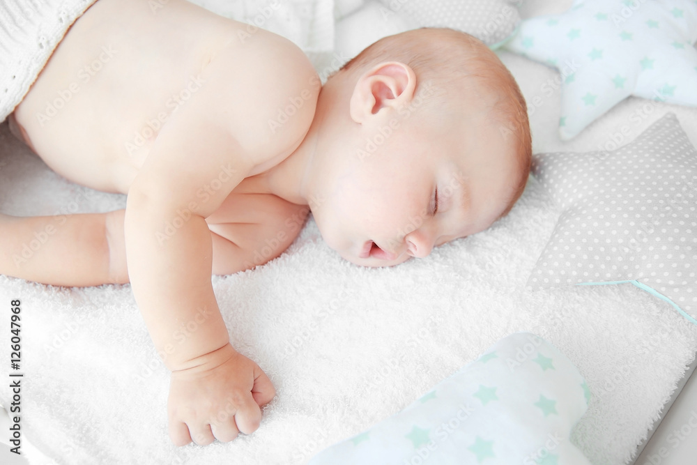 Little baby sleeping in crib closeup Little baby sleeping in crib closeup
