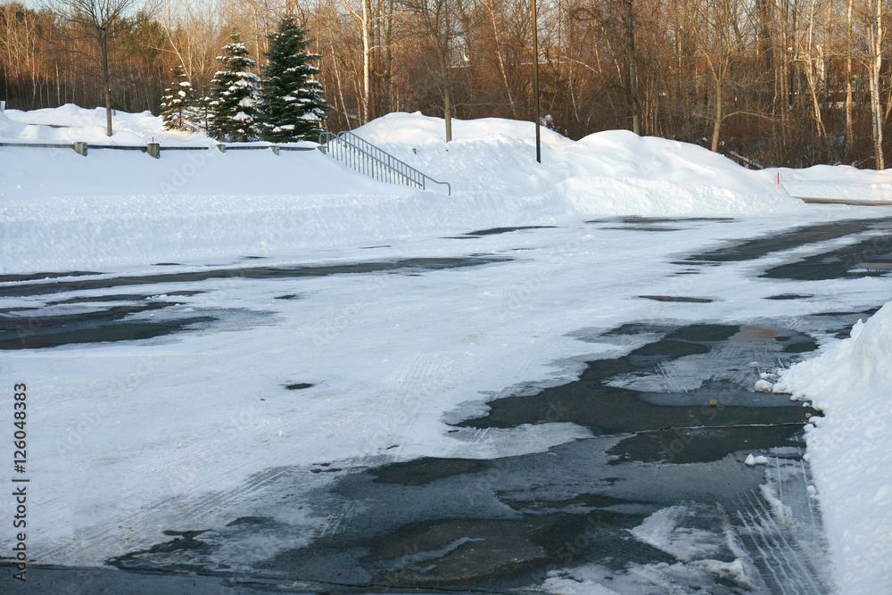 Naklejka premium empty parking lot with snow removed