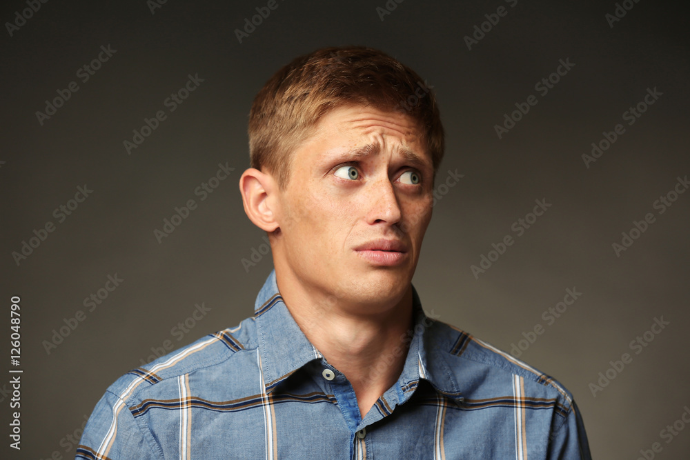 Portrait of stylish man on dark background Portrait of stylish man on dark background