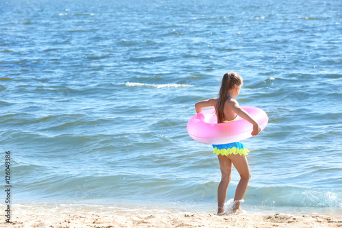 Cheerful little girl with p...