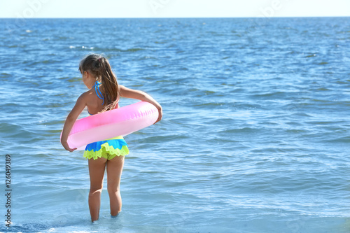 Cheerful little girl with p...