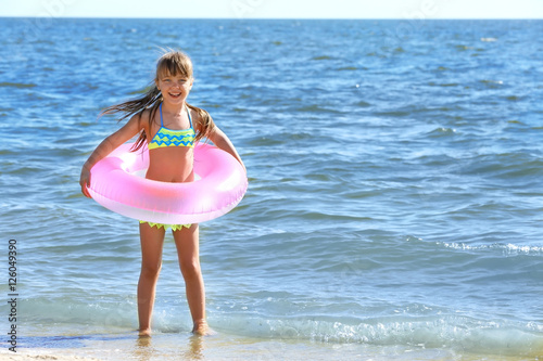 Cheerful little girl with p...