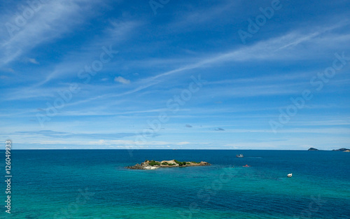 Island, clear seawater and blue sky background © tonguy324