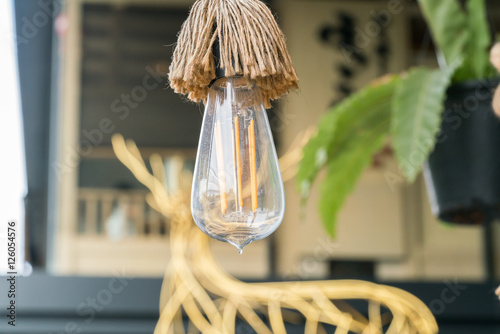 Edison's light bulb and lamp in modern style.   © praphab144