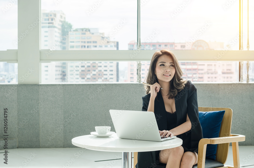 Beautiful businesswoman working at office